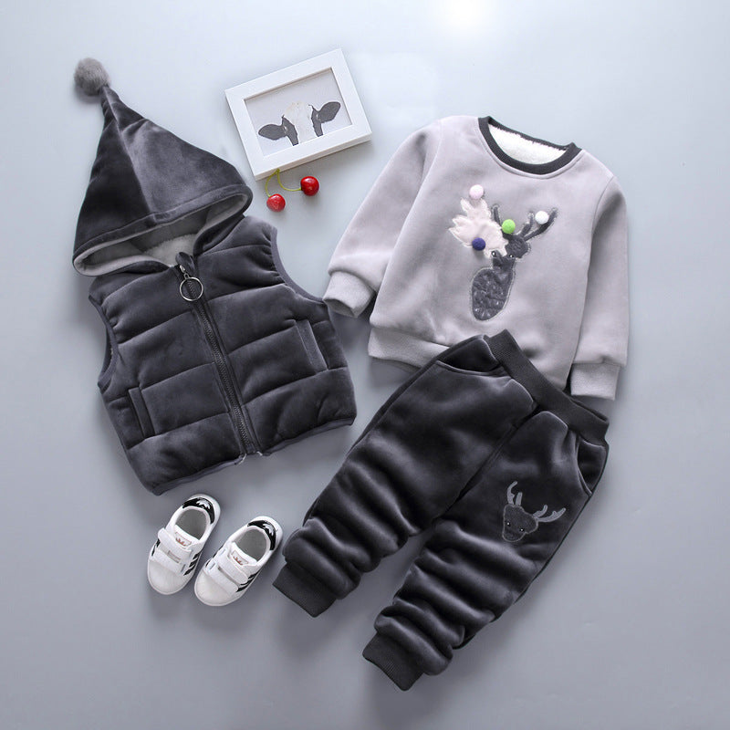 Children's clothing set with gray hooded vest, sweatshirt, and pants on a light gray background.