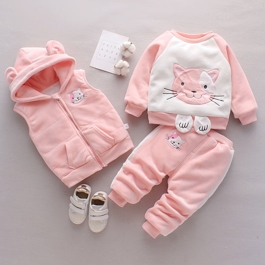 Pink baby outfit with cat design on a gray background